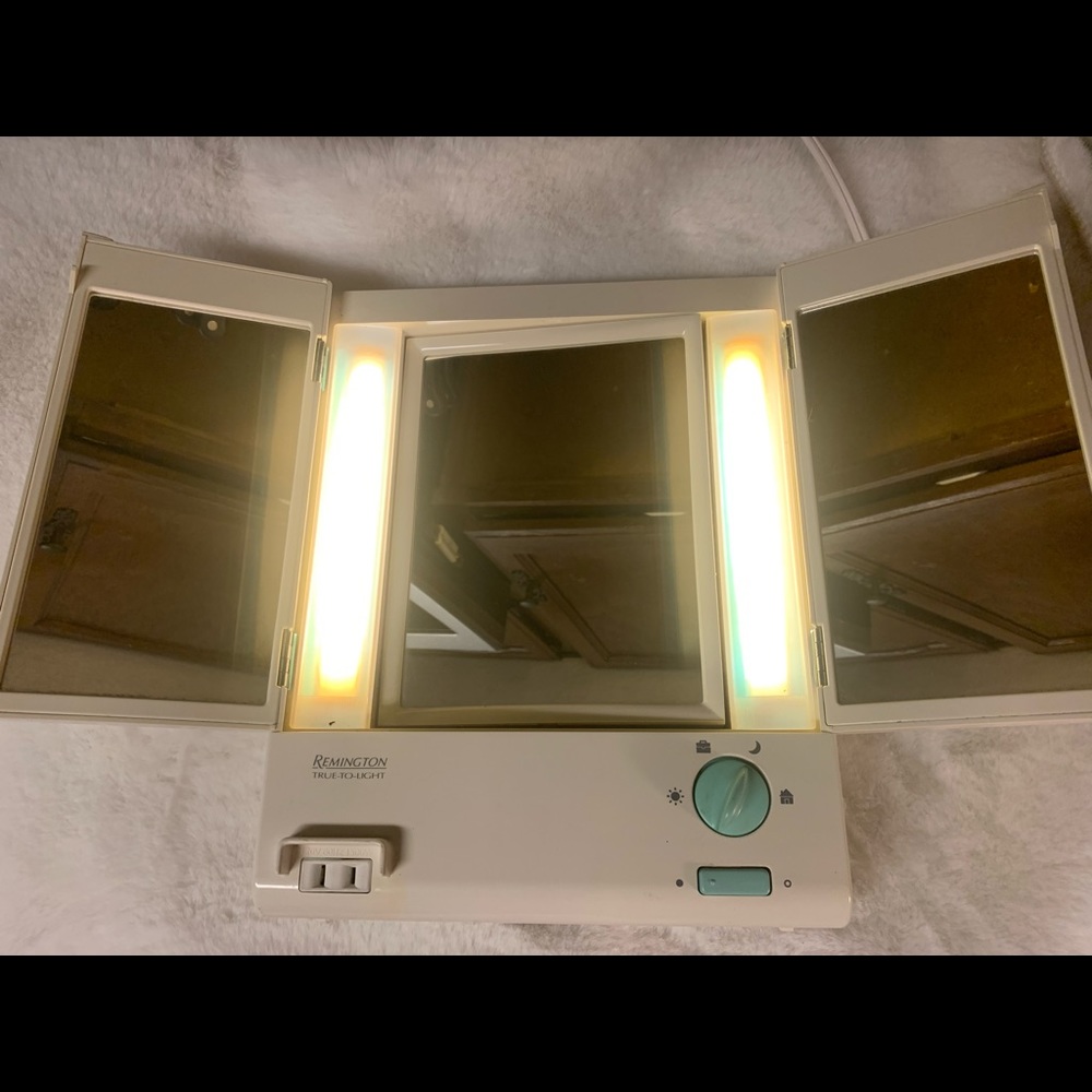 Vintage Remington vanity mirror